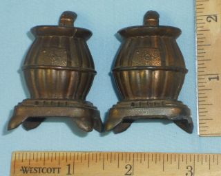 Vintage Pot Belly Stove Salt and Pepper Shakers one is marked White 
