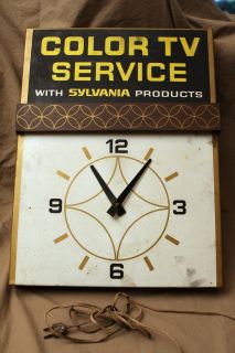   Electric Wall Clock Color TV Service With Sylvania Products