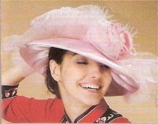 Women pink church derby wedding hat rose, feather, and mesh deco