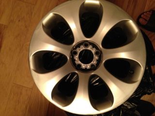 19 inch BMW 6 Series stock rims with 3 tires at 30% tread