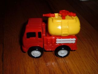 Vintage Toyotoys Red Rescue Vehicle Fire Engine with Water Tank On It 
