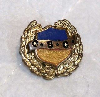VINTAGE GOLD AND ENAMELED PINBACK BASTIAN BROS. COLLEGE PIN