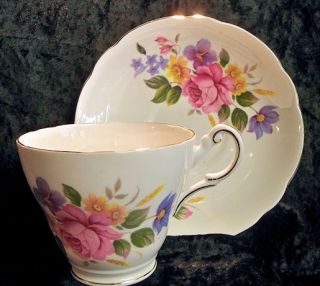  English Bone China Tea Cup & Saucer   Pink Roses, Blue/Yellow Flowers