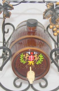 whiskey barrel bottle on metal stand vintage bar bottle made in Japan 