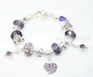 silver charm bracelet in Jewelry & Watches