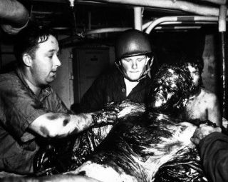 1944 MR Coast Guard Seaman Scraped Of Oil Coating Photo