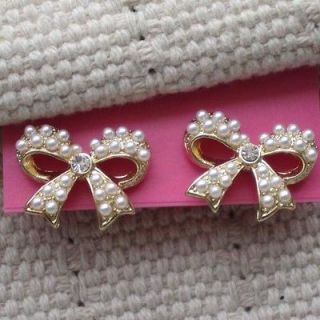 gold bow stud earrings