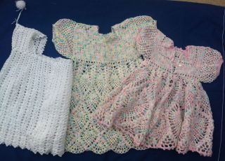 Three vintage knit baby clothes (two dresses, one shawl) 12 18 mos 