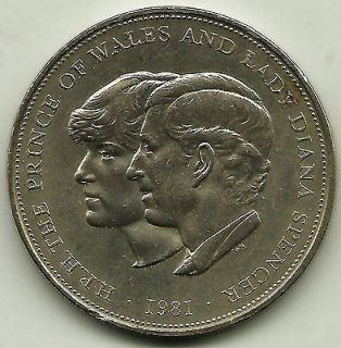 1981 CHARLES and DIANA WEDDING CROWN Commemorative Coin has bag marks.