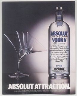 1994 Absolut Attraction vodka bottle & bending glass ad