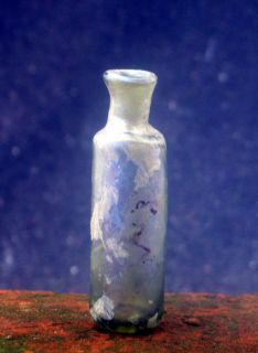 Authentic 17th century medicine green glass bottle.
