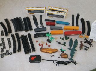   HO SCALE ~78 pcs. of TRACKS ~ 8 TRAINS ~ ANIMALS ~PEOPLE ~POWER PACK