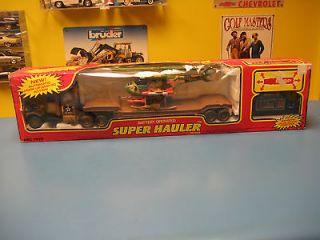SUPER HAULER FLAT BED WITH HELICOPTOR REMOTE CONTROL TOY