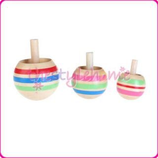 wooden spinning tops in Spinning Tops