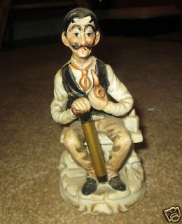 BISQUE OLD MAN FIGURINE SITTING WITH PIPE UNMARKED 6 INCHES HIGH