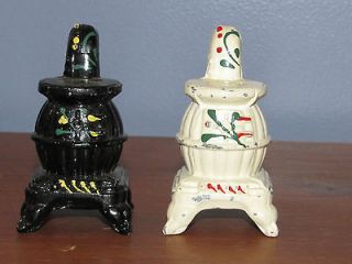 VINTAGE CAST IRON, POT BELLY STOVE SALT & PEPPER SHAKERS  MADE IN 