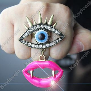 Blue Evil Eyes Eyelash Pink Lip Vampire Teeth Finger Ring Goth Punk 