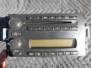   06 07 Chevrolet Corvette AM/FM Stereo 6 Disc CD Player Radio 15877007
