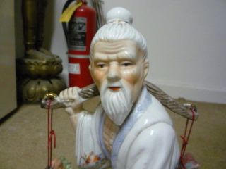 china porcelain lifelike fisherman with red carp old statue figurine