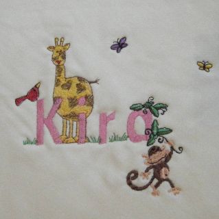 Our organic quilts are embroidered with your babys name entwined 