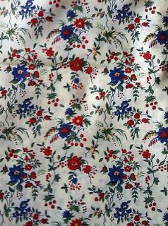 LIBERTY OF LONDON~TANA LAWN~CREAM BACKGROUND WITH RED AND BLUE~1m 