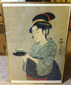 Okita of the Naniwaya, with a cup of tea Kitagawa Utamaro Woodblock 