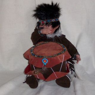 Newly listed Cathay Porcelain Native American Doll Logan by Drum
