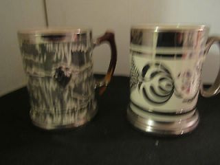 PAIR OF ARTHUR WOODS ENGLISH CHINA AND SILVER PLATED TANKARDS BOTH 