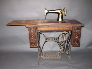antique 1913 singer sewing treadle machine w cabinet egyptian revival