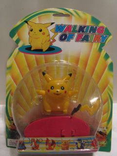 Pokemon Surfing Pikachu Wind Up Figure w/t Surfing Motion *MINT*