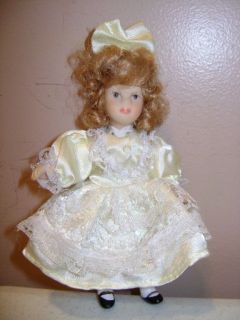 Precious 5 Tall Porcelain Doll With Big Yellow Bow In Hair To Match 