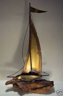 vintage 17 metal sail boat sculpture mounted on drift one