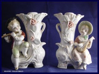 vintage ucagco ceramic boy and girl figurine bud vase set