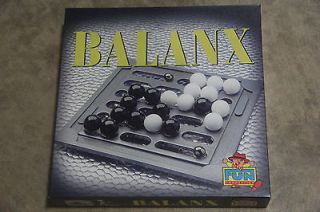   game board gameboard balance topple tip over marbles balls tilt tilted