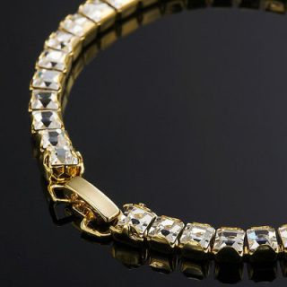   Gold Layered Tennis Bracelet Featuring 34 Swarovski Crystals $169