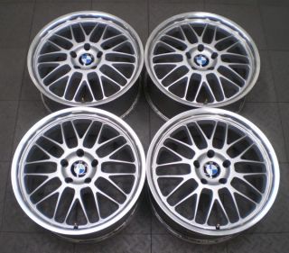 Full set of four (4) aftermarket wheels from a used 5 Series BMW