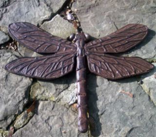 up for auction is a extra large dragonfly stepping stone cast iron in 