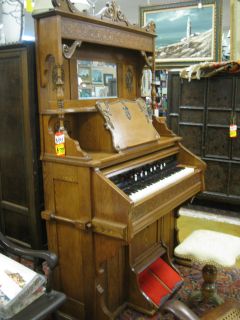 Click the pictures to see our video of this antique pump organ