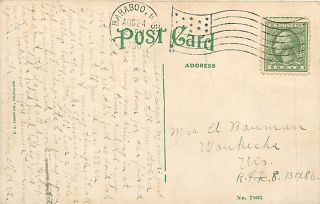 IMPRINT FROM POSTAL CANCEL AND SOME POSTAL INK ON FRONT OF CARD
