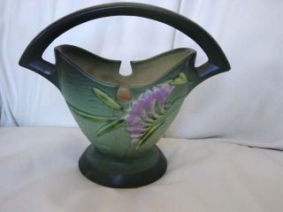  from our virtual store is a Roseville Pottery Freesia 7 basket 