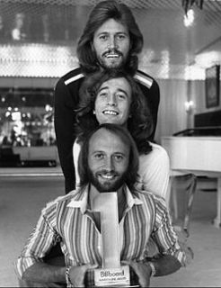 Bee Gees in 1978 (top to bottom) Barry, Robin, and Maurice Gibb