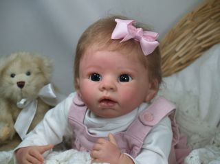 This precious baby girl started out as the Amelie Cradle Kit sculpted 