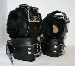 Wrist and ankle cuffs   shows fur covering, locking buckle and D Ring.