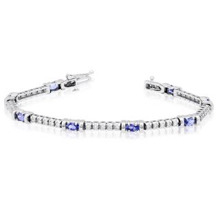 White Gold Alluring Sparks Prong Set Oval Tanzanite and Round Diamond 