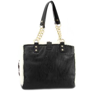 This Betseyville Poodle Gal Tote  features contrasting faux fur 