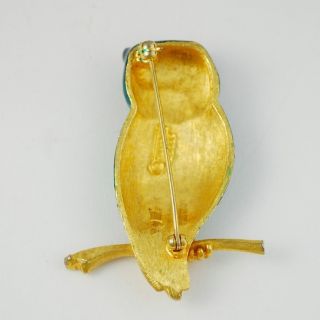 mid century boucher owl brooch enameled in blue and green and looking 