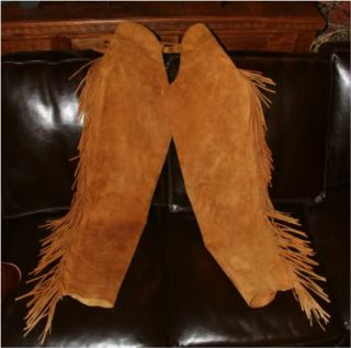 Beautiful brown suede leather with fringe along the length of outside 