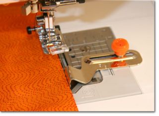 original brother foot color of adjustment knob varies from orange to 