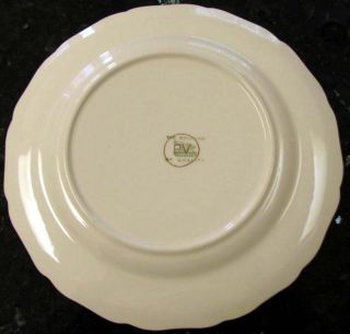 encircled pv in gold and the green canonsburg pottery trademark