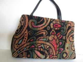 Sweet large paisly print with shades of orange, blue, green and red on 